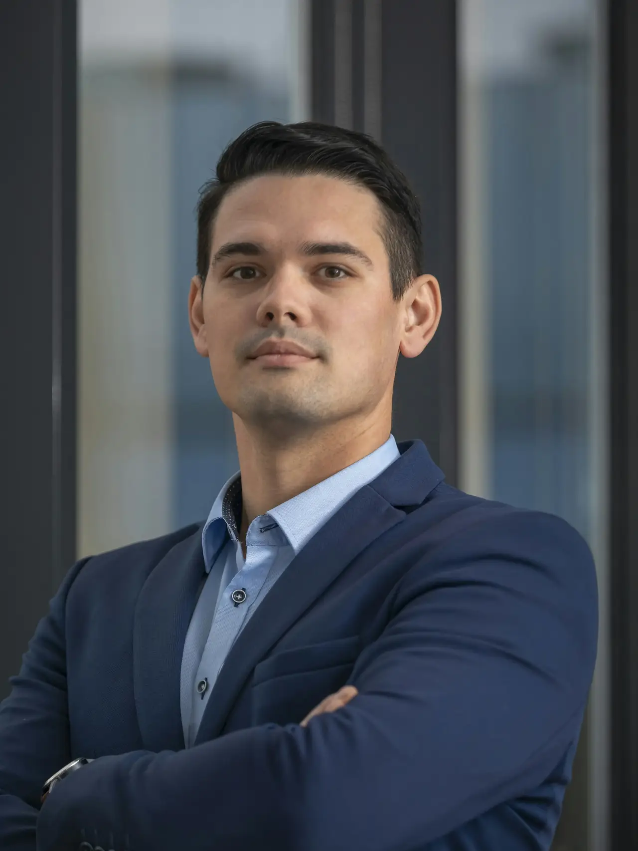 Construction executive in a suit in his office
